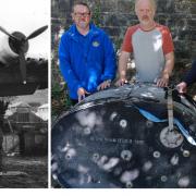 Barry Davies (centre) shows the Sunderland fuel tank to Heritage Centre volunteers Paul Emens (left) and Malcolm Miles.