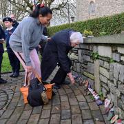 Members of the public were able to design painted pebbles and place them during the service.