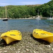 Yellow canoes in Solva
