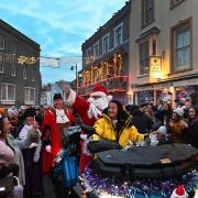 Father Christmas arrives in Tenby to turn on the Christmas lights