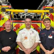 Gareth, Emyr and Cian Jones, three generations of the same family with a combined 73 years of firefighting service.
