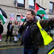Protestors took to the streets of Haverfordwest demanding that MPs support a Gaza ceasefire.