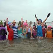 A flurry of fancy dress at Saundersfoot New Year's Day Swim