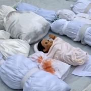 Protestors laid shrouds in Castle Square in a mock funeral to protest at the deaths in Gaza.