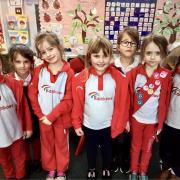 Young Rainbows in the uniform to mark World Thinking Day