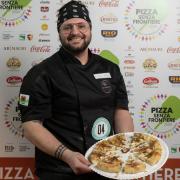 Giovanni with his prize-winning pizza