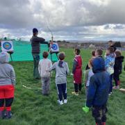 The children took part in activities including archery