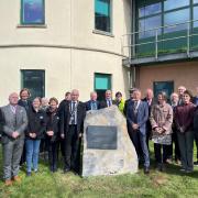 Councillors unveil a COVID-19 memorial stone outside Pembrokeshire County Hall