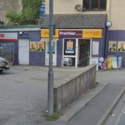 A man was accused of damaging a wall outside the Premier store in Haverfordwest.