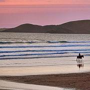 A sunset horse-ride on Newgale beach.