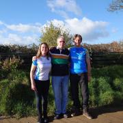 Edd and Donna, pictured with Richard, will be running the Paris Marathon this weekend to raise money for an AED