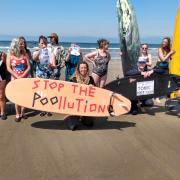 A message on a surf board at the demonstration.
