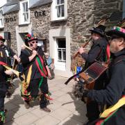 Heb Enw Morris perform at the opening of Fishguard Folk Festival,