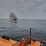 Tenby lifeboat carried out the rescue 12 miles out at sea