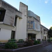 A man has denied a series of domestic abuse charges at Swansea Crown Court.