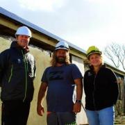 National Trust’s Mike Greenslade (left) and Bethan Jones (right) with Outer Reef Surf School’s Dean Gough (centre).