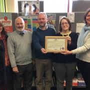Pictured are Pam Anthony (Libraries Operations Manager), Julie Campbell (IiC Officer), Cllr Mike James (PCC Carers Champion), Stuart Croxford (Site Co-ordinator and Carer Lead), Laura Evans (Library Development Officer), Cllr Tessa Hodgson (Cabinet