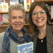 Delyth Jenkins with her daughter Angharad Jenkins holding a copy of her new book