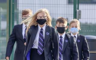 Pupils have had to wear masks while in to school in England and Wales. Picture: PA Wire