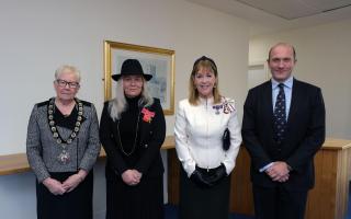 OBE recipient Samantha Birch, second from left, is pictured with, from left: Council Chairman Cllr Pat Davies, Lord-Lieutenant of Dyfed Miss Sara Edwards, and Council Chief Executive Will Bramble. Picture: Pembrokeshire County Council