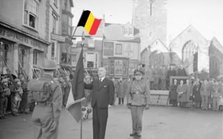New colours being presented to Second World War Belgian troops at Tenby by the Belgian Prime Minister Monsieur Hubert Pierlot.