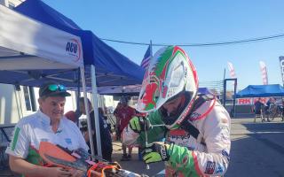 Rhys Evans from Newcastle Emlyn makes some quick adjustments minutes before he leaves the start line on day three of the ISDE in Argentina.