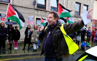 Protestors took to the streets of Haverfordwest demanding that MPs support a Gaza ceasefire.