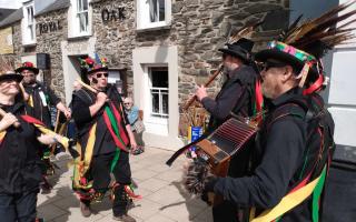Heb Enw Morris perform at the opening of Fishguard Folk Festival,